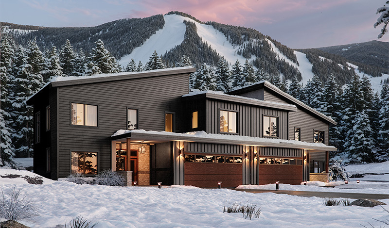 Modern ski-in ski-out townhome at Killington with large windows, dark siding, and mountain views.